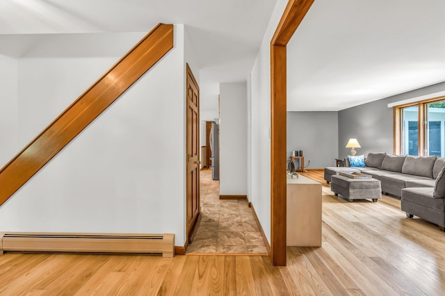 60 Evergreen Dr, Hermon, ME 04401 - corridor featuring a baseboard heating unit and light wood-type flooring