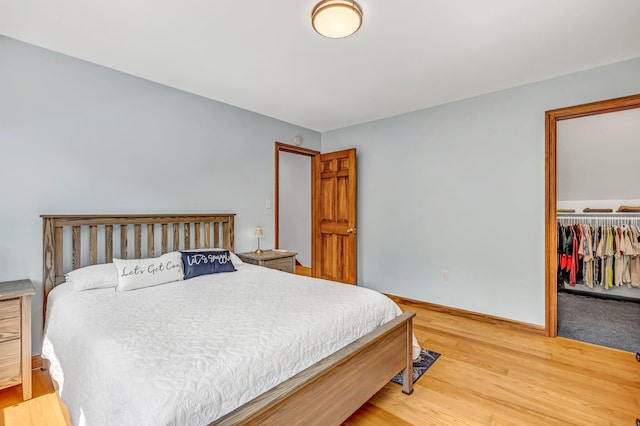 60 Evergreen Dr, Hermon, ME 04401 - bedroom with light wood finished floors, a closet, and a spacious closet