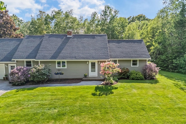 60 Evergreen Dr, Hermon, ME 04401 - rear view of house featuring a lawn, a chimney, and roof with shingles