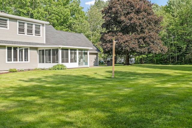 60 Evergreen Dr, Hermon, ME 04401 - view of green lawn with a sunroom