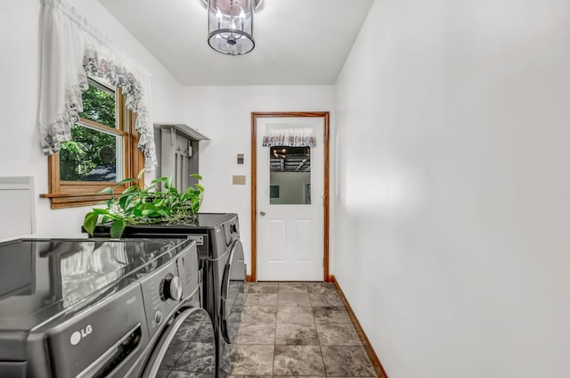 60 Evergreen Dr, Hermon, ME 04401 - laundry room featuring washing machine and clothes dryer and light stone finish flooring