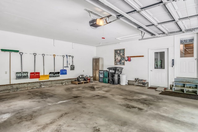 60 Evergreen Dr, Hermon, ME 04401 - garage featuring a garage door opener