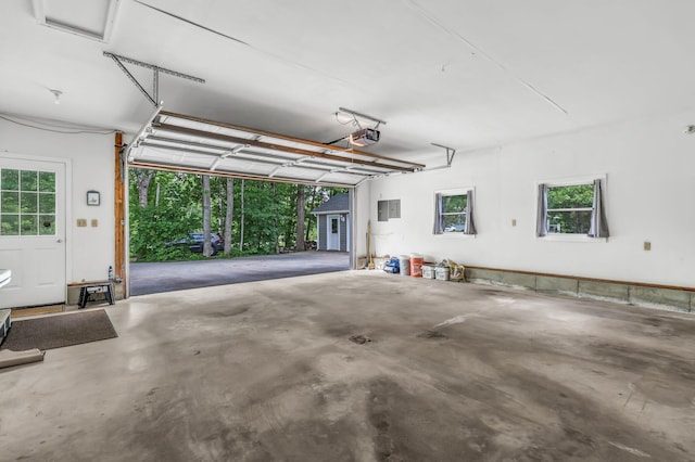 60 Evergreen Dr, Hermon, ME 04401 - garage with electric panel and a garage door opener