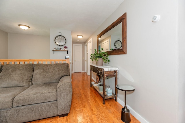 77 Toothaker Pond Rd, Phillips, ME 04966 - living area featuring light wood-style flooring and baseboards