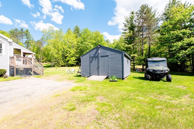 77 Toothaker Pond Rd, Phillips, ME 04966 - view of green lawn featuring view of wooded area and a wooden deck