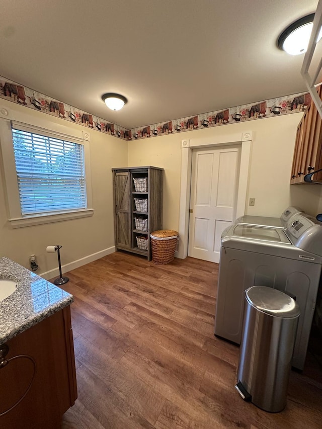 46 3rd St, Presque Isle, ME 04769 - laundry area with cabinet space, independent washer and dryer, and dark wood-style flooring