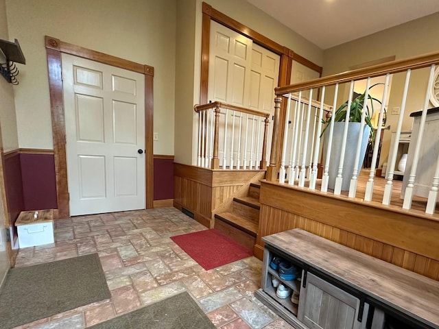 46 3rd St, Presque Isle, ME 04769 - foyer entrance with stairs and baseboards