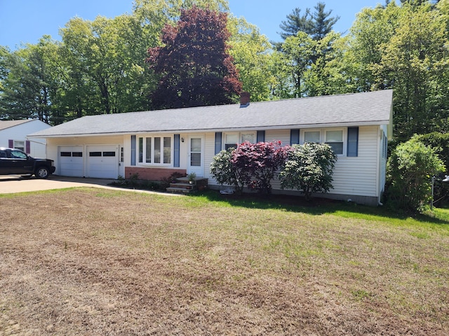 18 Oak St, Jay, ME 04239 - ranch-style house featuring an attached garage, a front lawn, driveway, and a chimney