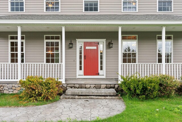20 Motorcycle Dr, Windham, ME 04062 - view of exterior entry with a porch