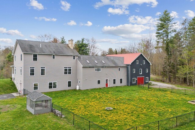 20 Motorcycle Dr, Windham, ME 04062 - rear view of house with a chimney