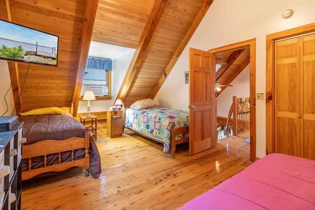 32 Sandy Beach Rd, Danforth, ME 04424 - bedroom featuring light wood-type flooring, wooden ceiling, cooling unit, and a closet