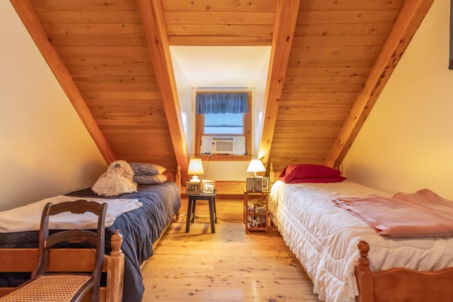 32 Sandy Beach Rd, Danforth, ME 04424 - bedroom featuring wood finished floors, wooden ceiling, cooling unit, and lofted ceiling
