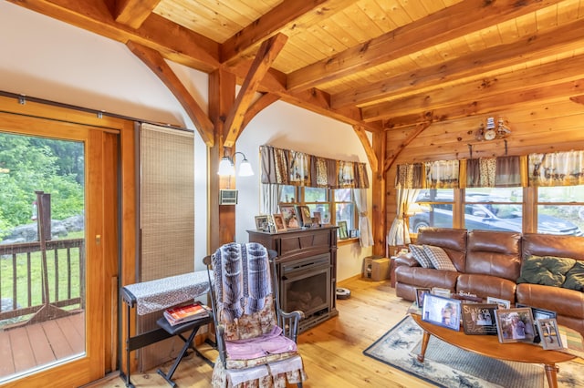 32 Sandy Beach Rd, Danforth, ME 04424 - living area with light wood finished floors and wood ceiling with exposed beams