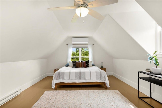 276 N Sedgwick Rd, Sedgwick, ME 04676 - bedroom with a baseboard radiator, a wall mounted AC, lofted ceiling, wood finished floors, and baseboards