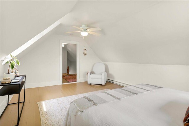276 N Sedgwick Rd, Sedgwick, ME 04676 - bedroom with wood finished floors, lofted ceiling, and ceiling fan