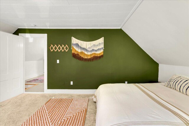 276 N Sedgwick Rd, Sedgwick, ME 04676 - bedroom featuring lofted ceiling and carpet