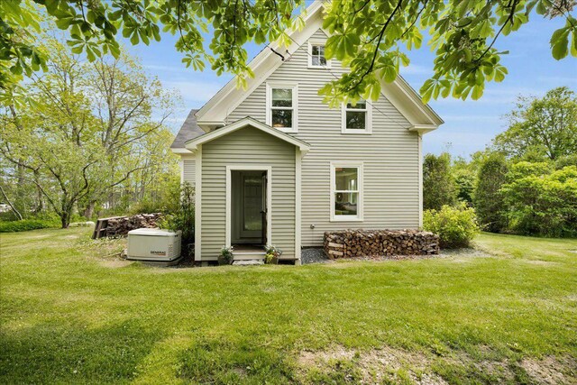 276 N Sedgwick Rd, Sedgwick, ME 04676 - back of house featuring a yard