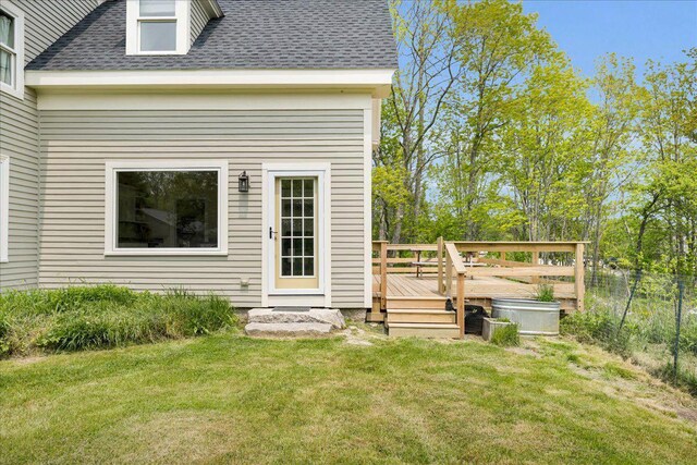276 N Sedgwick Rd, Sedgwick, ME 04676 - property entrance featuring a wooden deck and a shingled roof