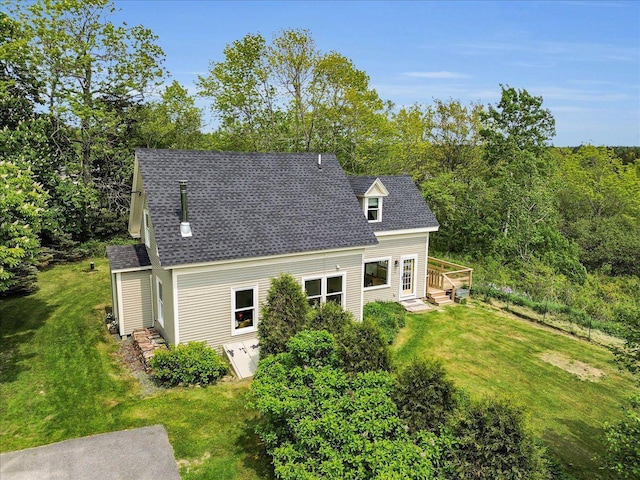 276 N Sedgwick Rd, Sedgwick, ME 04676 - back of house with a yard, a shingled roof, and a wooden deck