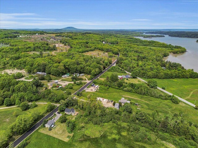 276 N Sedgwick Rd, Sedgwick, ME 04676 - aerial view of property's location featuring a large body of water and a heavily wooded area