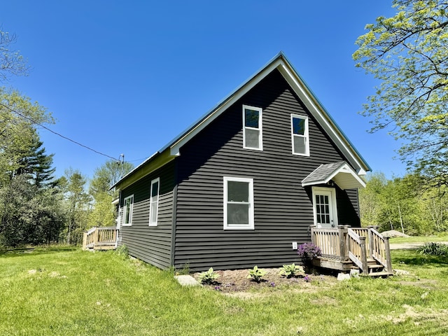 338 River Rd, Bucksport, ME 04416 - back of property featuring a yard