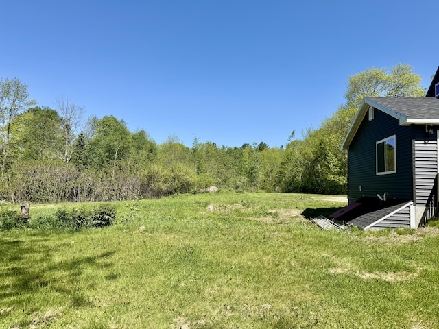 338 River Rd, Bucksport, ME 04416 - view of yard featuring a forest view