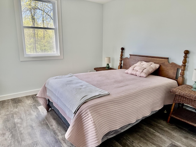 338 River Rd, Bucksport, ME 04416 - bedroom featuring wood finished floors and baseboards