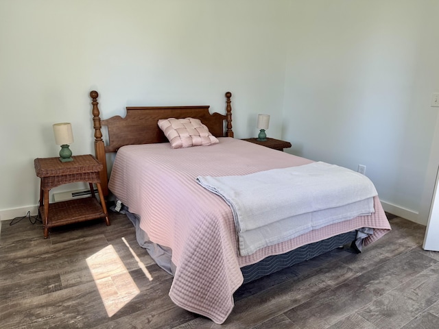 338 River Rd, Bucksport, ME 04416 - bedroom with wood finished floors and baseboards