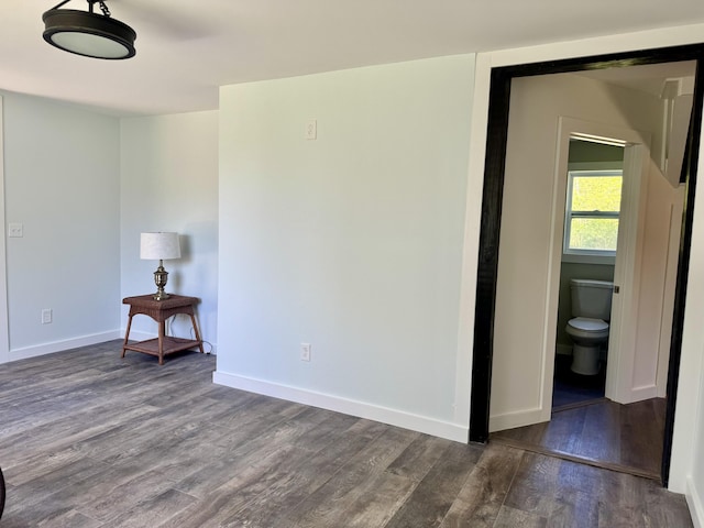 338 River Rd, Bucksport, ME 04416 - spare room with dark wood-type flooring and baseboards