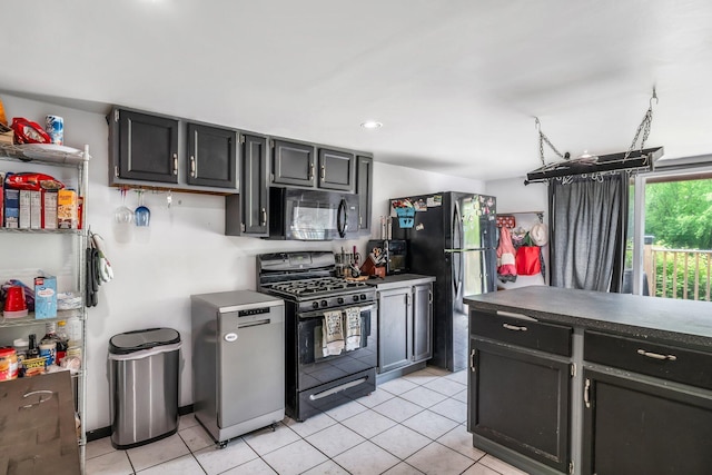 54 Old Canton Rd, Dixfield, ME 04224 - kitchen with black appliances, light tile patterned floors, dark cabinets, and recessed lighting