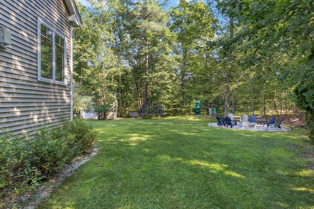 3 Highpointe Cir, Kittery, ME 03904 - view of grassy yard with an outdoor fire pit, a patio area, and a playground
