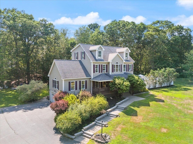 3 Highpointe Cir, Kittery, ME 03904 - view of front of house featuring driveway, a front lawn, and roof with shingles