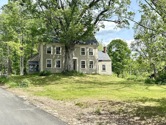 13 Mountain Rd, Newfield, ME 04095 - colonial-style house with a chimney and a front yard