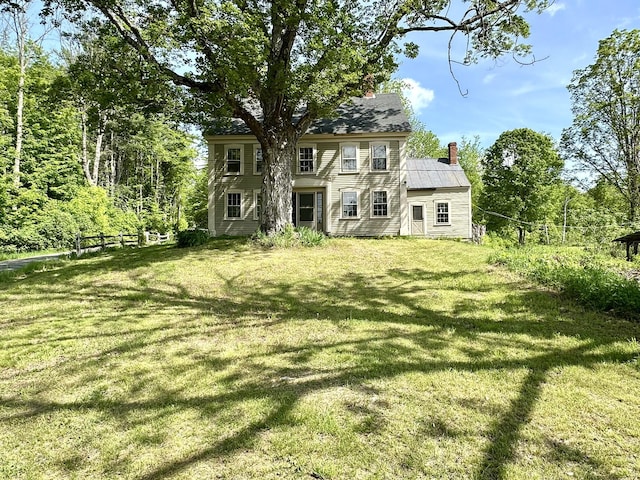 13 Mountain Rd, Newfield, ME 04095 - back of property with a chimney