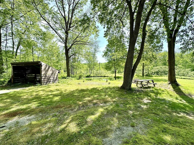 13 Mountain Rd, Newfield, ME 04095 - view of yard featuring a pole building and an outdoor structure