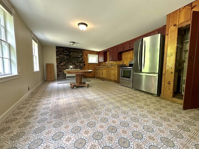 13 Mountain Rd, Newfield, ME 04095 - kitchen with stainless steel appliances, plenty of natural light, baseboards, and light flooring
