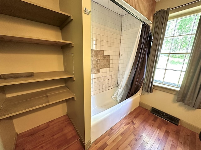 13 Mountain Rd, Newfield, ME 04095 - bathroom with wood finished floors, shower / bath combination with curtain, and baseboards