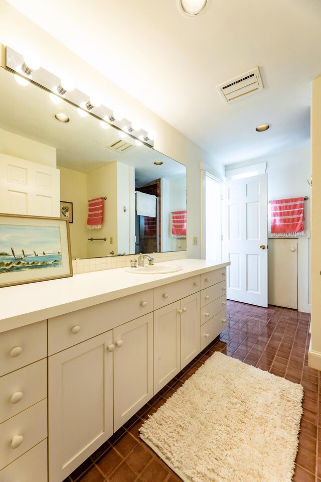 250 Davis Point Rd, Cushing, ME 04563 - bathroom featuring vanity and tile patterned flooring