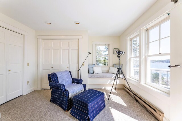 250 Davis Point Rd, Cushing, ME 04563 - living area with a baseboard radiator, plenty of natural light, carpet floors, and recessed lighting