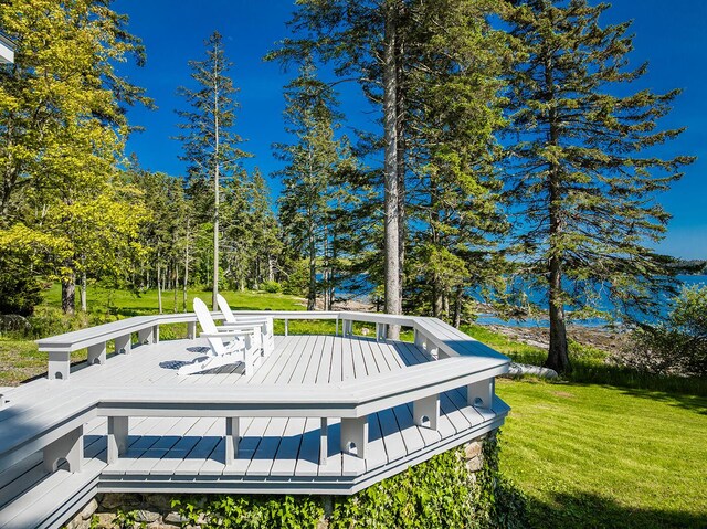 250 Davis Point Rd, Cushing, ME 04563 - wooden deck featuring a lawn and view of scattered trees