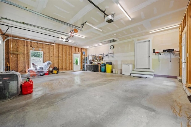64 New Settlement Rd, Hiram, ME 04041 - garage featuring a garage door opener
