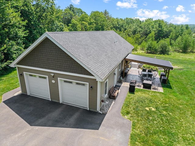 64 New Settlement Rd, Hiram, ME 04041 - garage featuring driveway