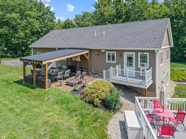 64 New Settlement Rd, Hiram, ME 04041 - rear view of property with a deck, a lawn, a shingled roof, a patio area, and view of wooded area