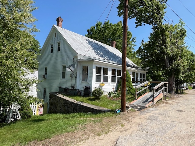 96 French St, Acton, ME 04001 - view of front of home featuring a chimney and metal roof