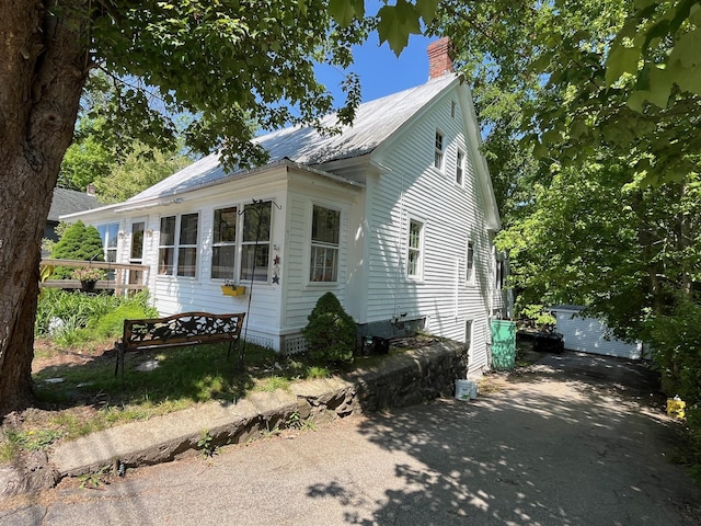 96 French St, Acton, ME 04001 - view of front of house with a chimney and an outdoor structure