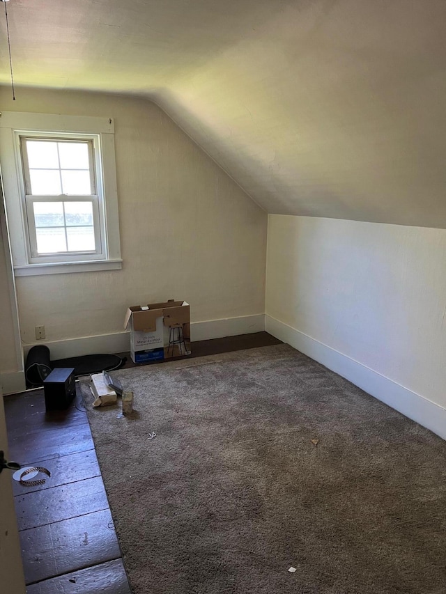 96 French St, Acton, ME 04001 - additional living space with lofted ceiling, baseboards, and carpet floors