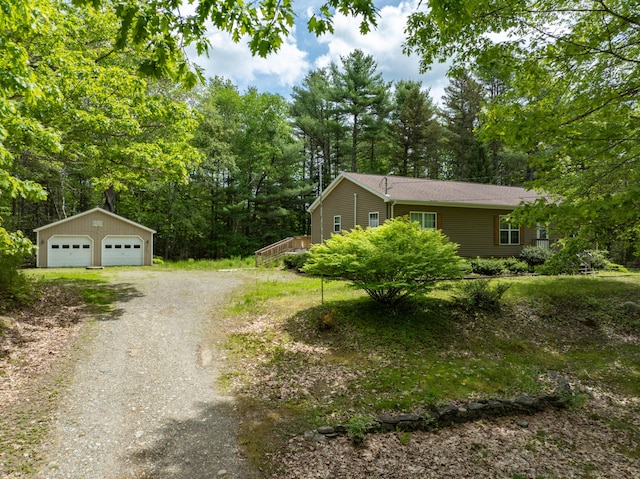 155 Crystal Cv, Waldoboro, ME 04572 - view of home's exterior with an outbuilding and a detached garage
