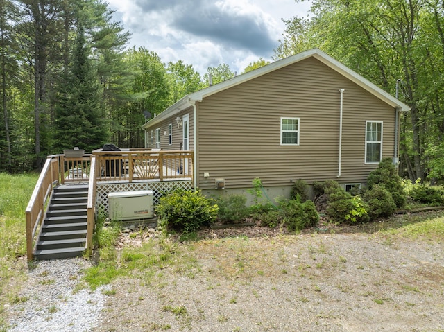 155 Crystal Cv, Waldoboro, ME 04572 - view of property exterior featuring stairs and a wooden deck