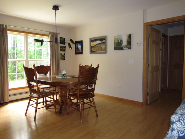 155 Crystal Cv, Waldoboro, ME 04572 - dining space with light wood-style floors and baseboards