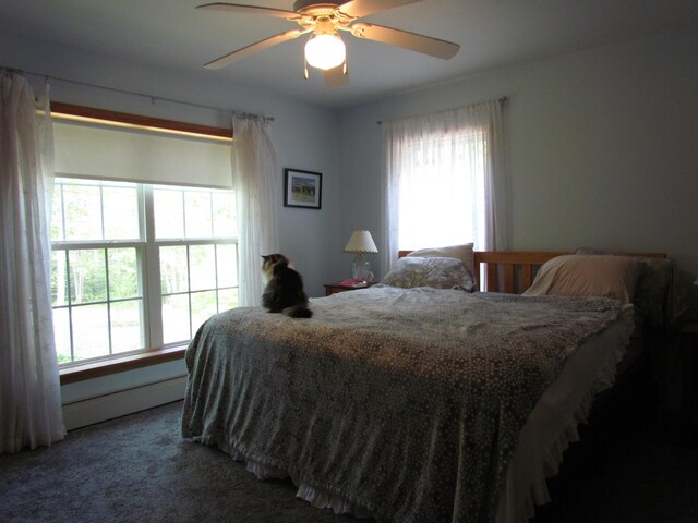 155 Crystal Cv, Waldoboro, ME 04572 - bedroom with multiple windows, baseboard heating, carpet flooring, and a ceiling fan